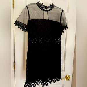 Little Black Dress! Classic stretch lace and tulle w/ keyhole back. Size 4-6